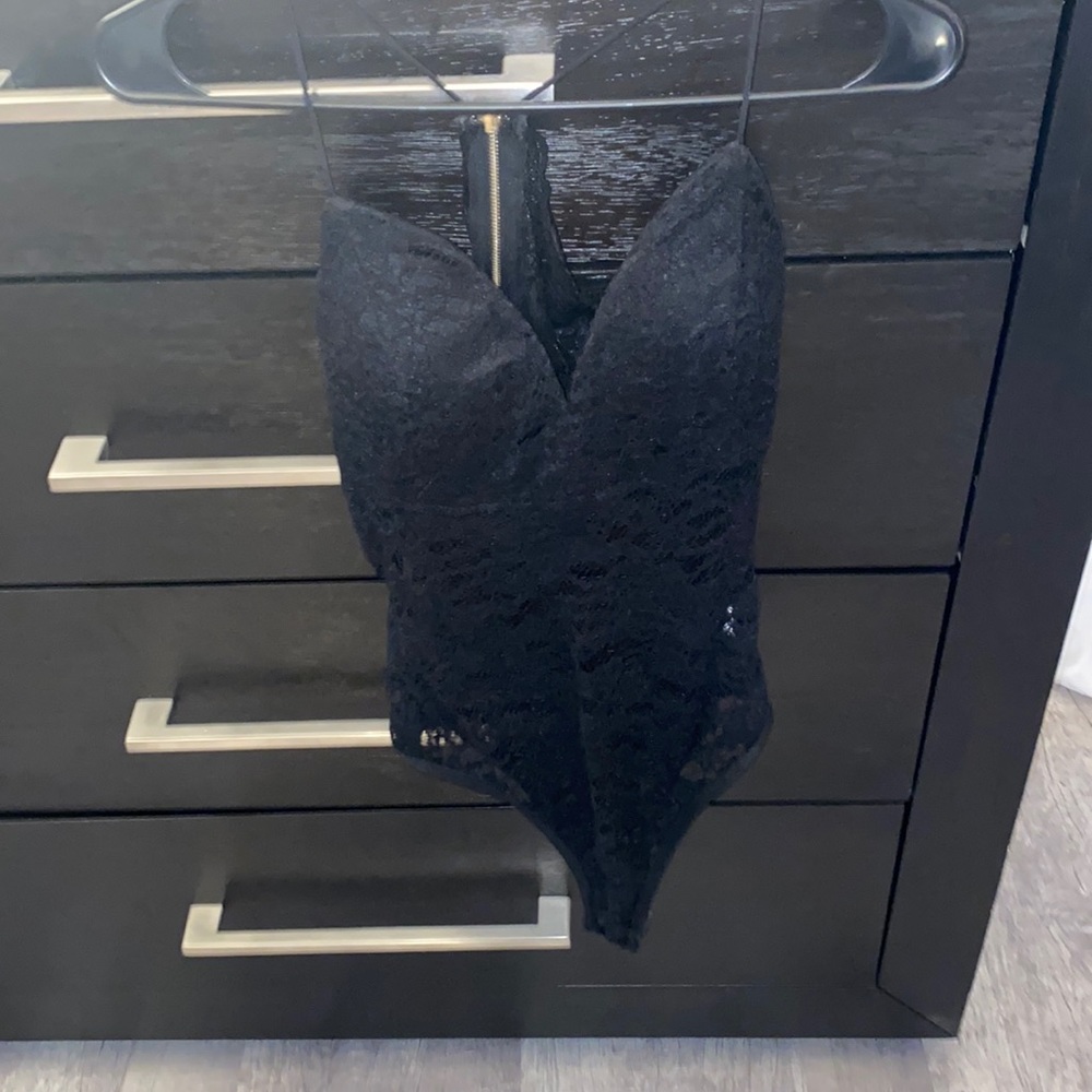 Black lace bodysuit. boobs are not see thru. back zippers up top
